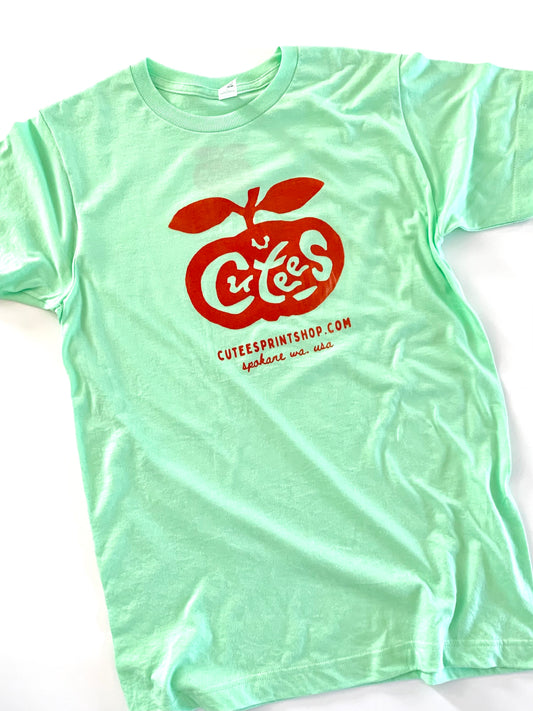 Cutees Original Logo Tee in Jade Green + Tomato Red, Every-body Fit